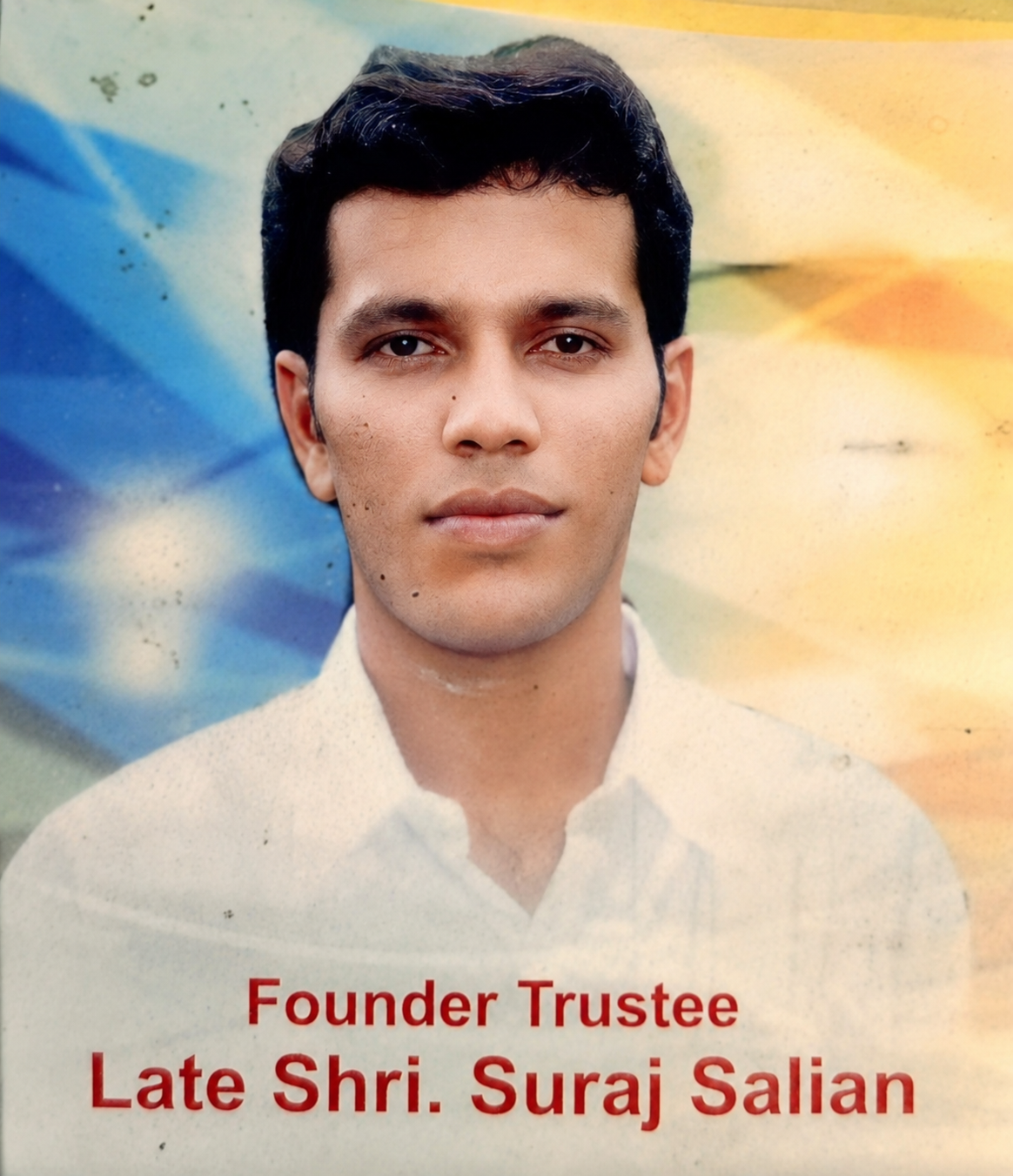 Memorial portrait of Shri Suraj Salian, late founder of Sunrise Foundation